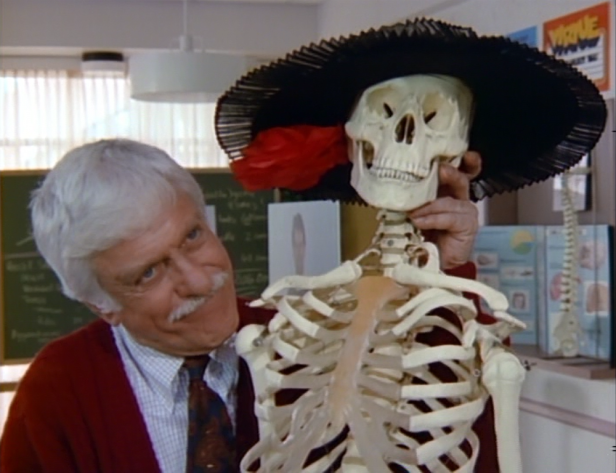 Dick Van Dyke with a skeleton.